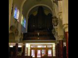 [Cliquez pour agrandir : 87 Kio] San Francisco - Notre-Dame-des-Victoires' church: the entrance and the pipe organ.